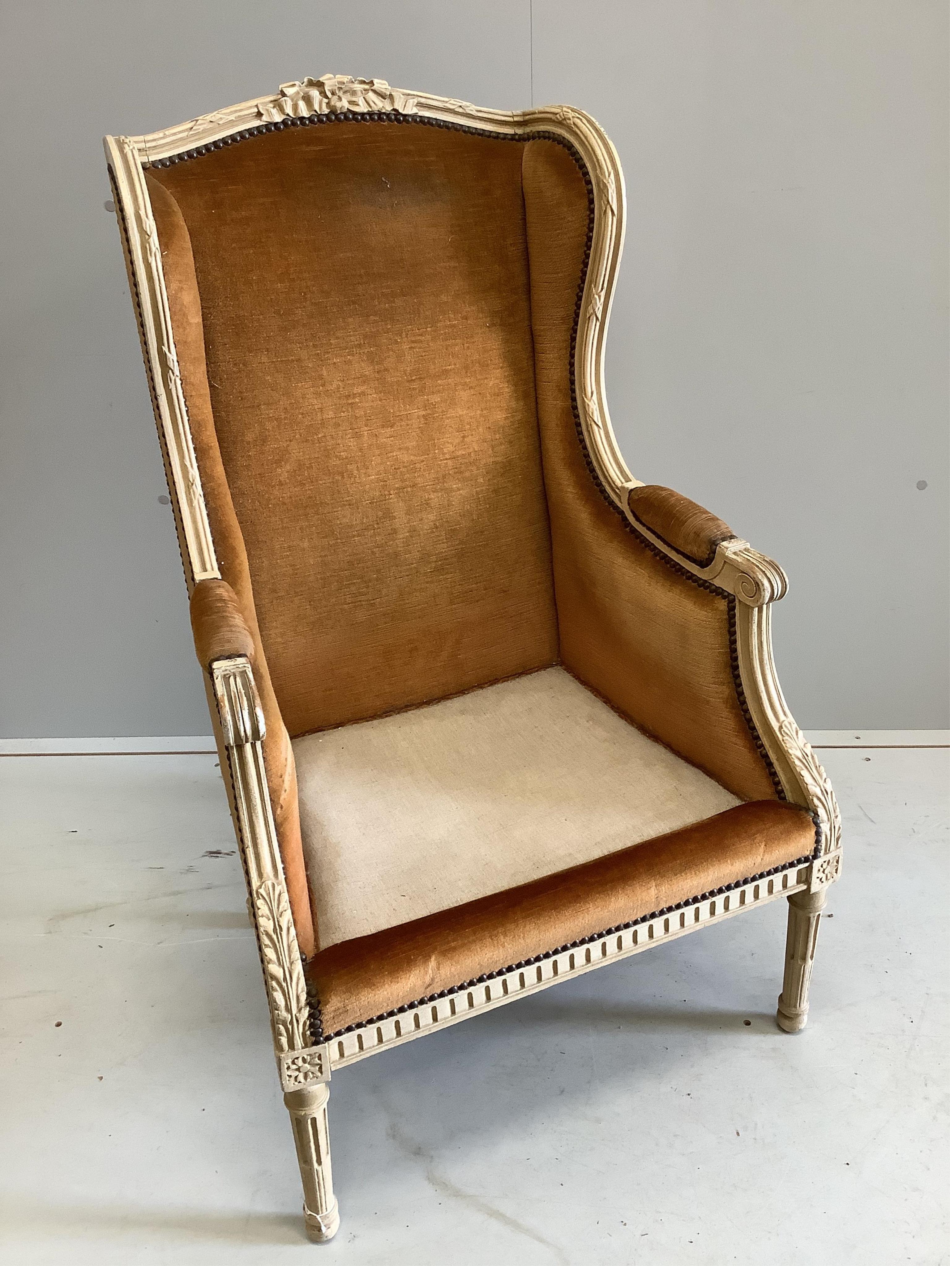 A Louis XVI style cream painted fauteuil, width 64cm, height 74cm. Condition - fair